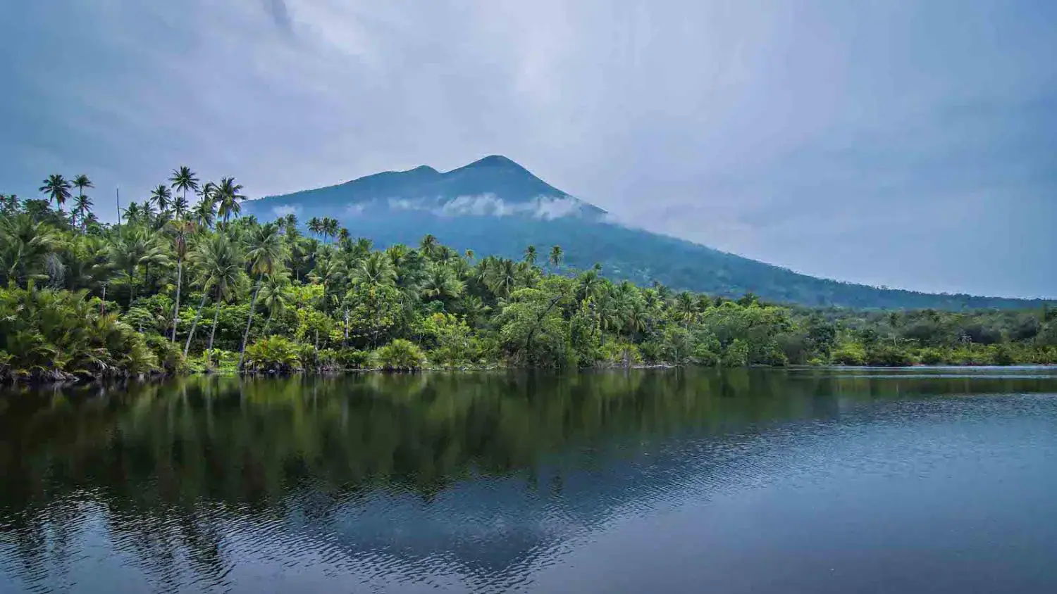 Beautiful landscape, greenery, volcano in the background, untouched nature