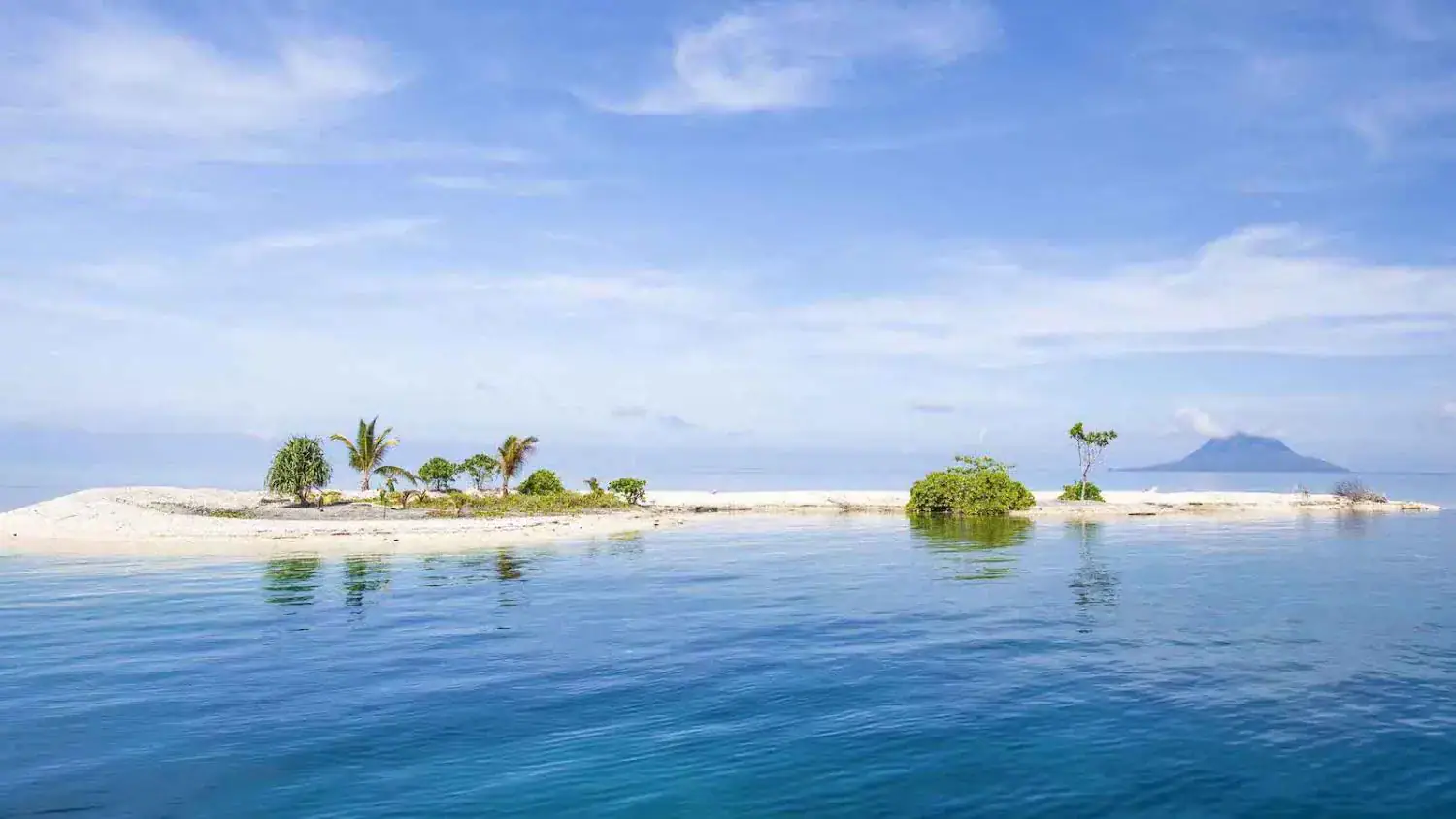 white sandbank, remote paradise, turquoise water, tropical escape, blue sky, untouched nature