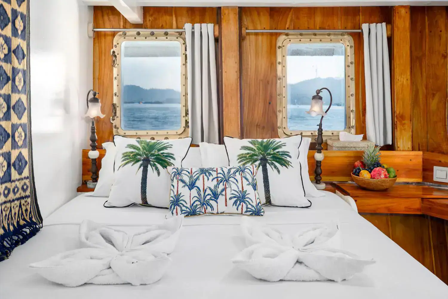 double bed sea view, boat cabin, wooden wall, sea view from bed