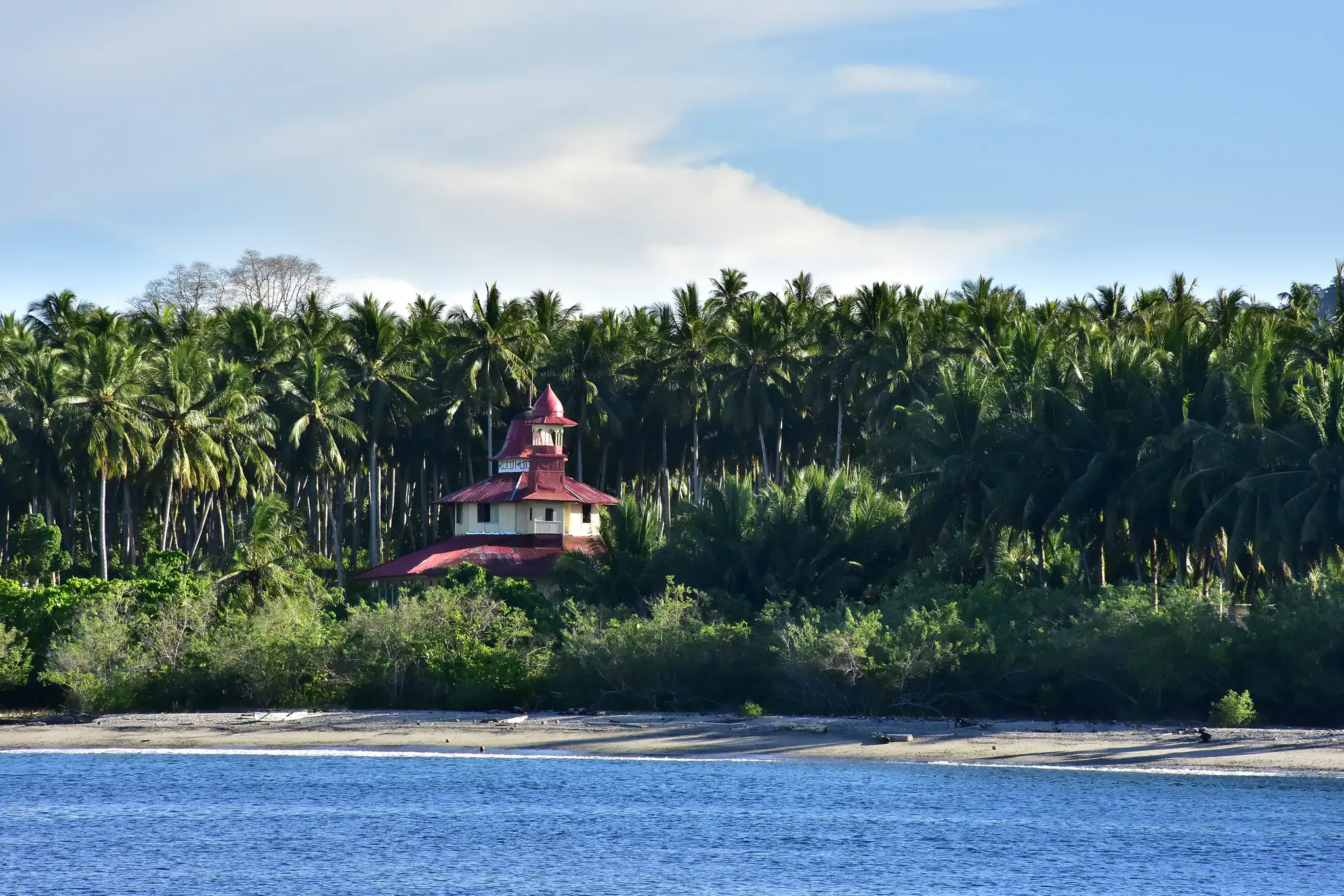 white sand beach, beautiful nature, isolated church, peaceful scenery, blue sky, tropical landscape