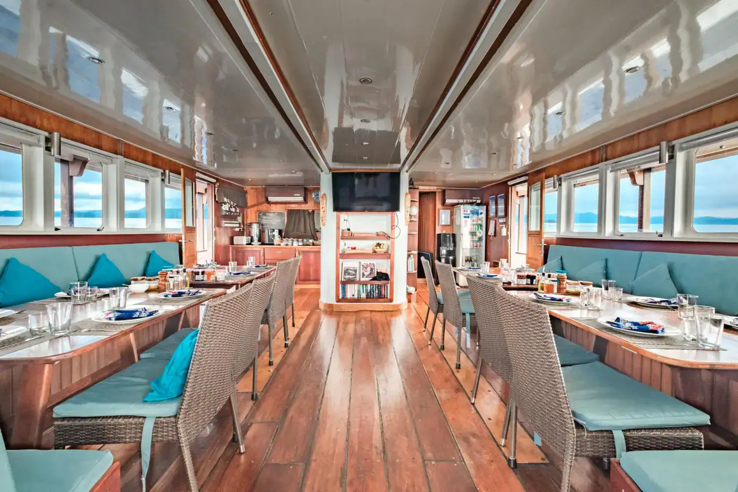 the restaurant a, indoor spot, dining tables, sofa all around the room, interior