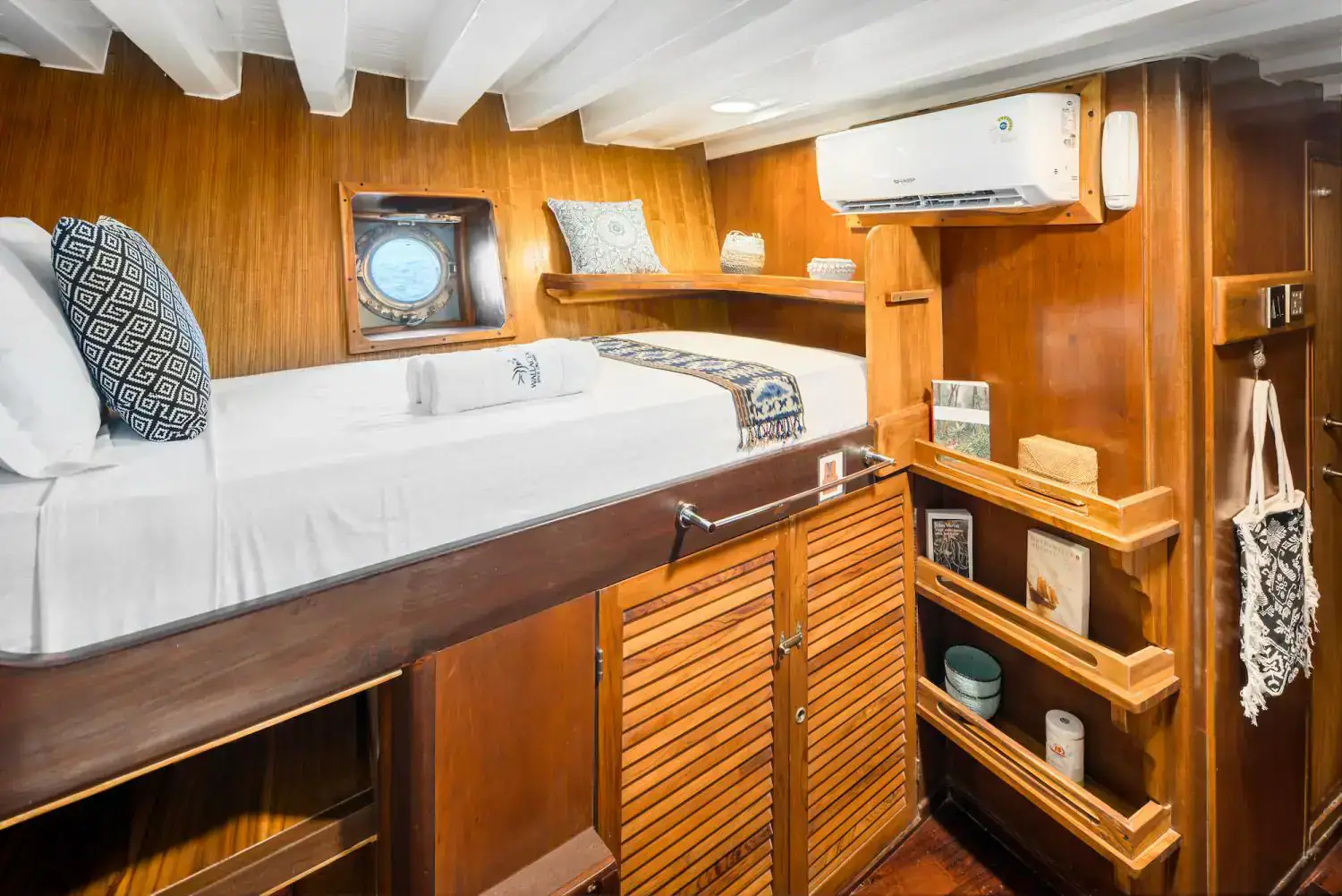 twin bed lower deck cabin, interior details, air conditioning, wooden interior 